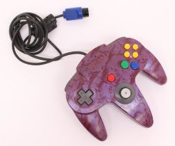 Nintendo: A Nintendo 64 Foxdata Purple Forest wired controller. A rare example of this item as there