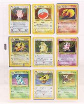 Pokemon: A complete Pokemon Unlimited Jungle Set, comprising 64/64 cards. Whitening to some card