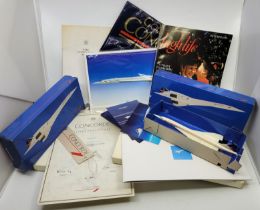 Two Concorde in-flight packs, the plastic folders containing flight certificate, cabin baggage