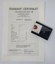 A round brilliant-cut diamond in perspex case, with Swedish Diamanthuset AB certificate stating 0.40