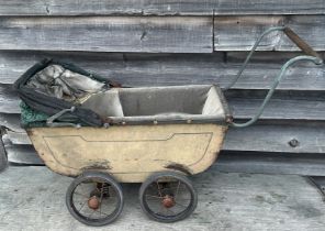 A vintage Toy pram and a collection of vintage Scalextric cars