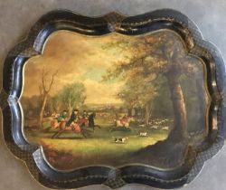 A Victorian black lacquered papier Mache tray, having ebonised border, the reserve painted with