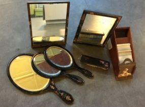 A collection of mirror together with a croupier