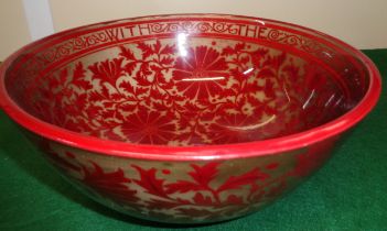 A flambe bowl inscribed with the seasons greetings.