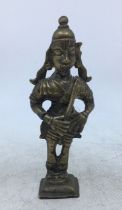 An Indian bronze figure of a deity.