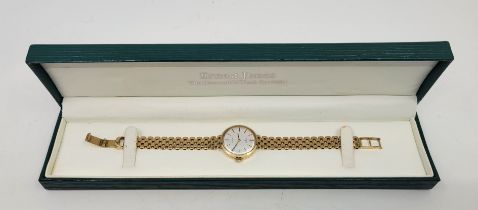 A 9ct. gold Rotary ladies' quartz wrist watch, c.1979, having signed silvered circular dial with