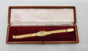 An 18ct. yellow gold ladies' bracelet watch, c.1955, manual movement, having white enamel circular