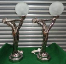 A pair of Art Deco style chrome finish table lamps. H:67cm