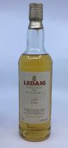 Whisky, Ledaig single malt from The Isle of Mull, 1974 vintage, level on top of shoulder, seal in