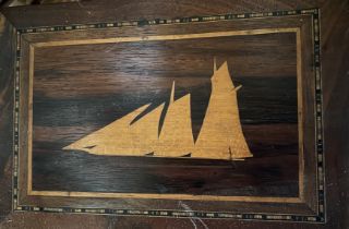 A wooden ship box and other similar items