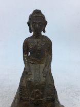 A Sino-Tibetan bronze figure of Buddha