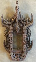 A Sino-Tibetan carved wooden frame. (a/f)