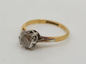 An 18ct. gold and platinum single stone diamond ring, claw set old-cut diamond (EDW 1.00 carats,