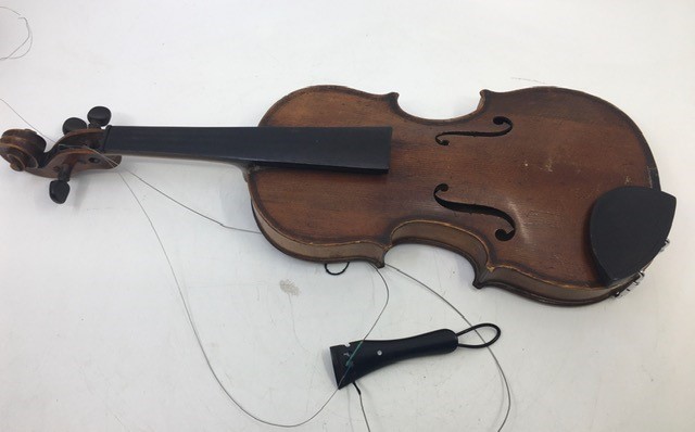 A tiny size JTL violin possibly 1/4 size