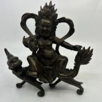 A Chinese bronze figure of a deity