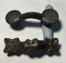 A pair of Saxon equal arm brooches. Circa 8th-10th century AD. Copper alloy brooch formed  of a