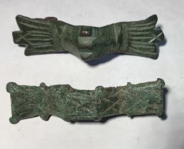 Lot containing a pair of Saxon Ansate brooches. Circa 8th-10th century AD. Copper alloy brooch