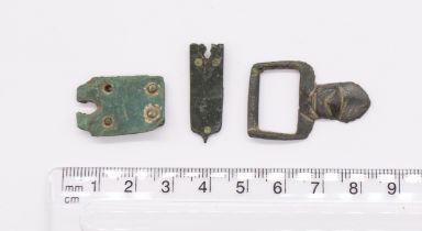 Mixed lot containing three medieval strap end items. Medieval sheet copper alloy rectangular