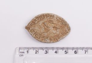 Large Medieval lead vesica seal featuring a large sleek cat (Cheetah or Leopard ). The lettering