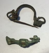 A very high quality and unusual copper alloy brooch with a hinged rather than sprung pin