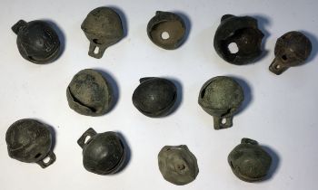 Collection of Post Medieval Crotal bells, two broken.