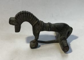 2nd/3rd century AD. A rare bronze zoomorphic brooch formed as a horse with a hooked catch