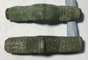 Lot containing a pair of Saxon equal arm brooches. Circa 8th-10th century AD. Copper alloy brooch