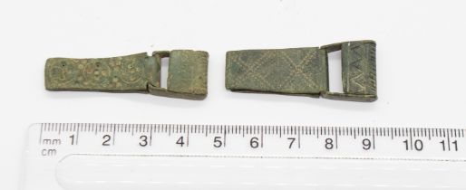 Pair of decorated medieval copper alloy folding clasp strap end belt fasteners. 13Th - 15th century.