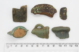 Bronze age weapon fragment group. Selection of six broken fragments of various bronze age weapons