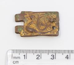 Medieval 13/15th Century copper alloy gilded buckle plate decorated with a peacock. H31mm. W18mm.