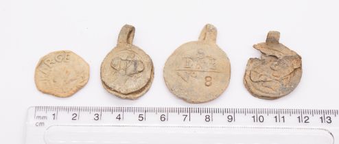 Lead cloth seal group. Lot contains four large lead cloth seals from around the 16th-17th century.