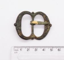 Tudor period 1485-1600 gilded copper alloy decorated double buckle with pin. H39.2mm. W50.2mm. 17.