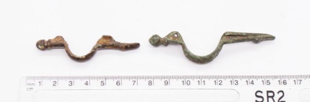 Saxon copper alloy Brooch group. Circa 6th-8th century. Pair of incomplete narrow cruciform