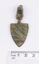 Medieval large copper alloy shield Pendant and hanger showing a single diagonal line from upper left