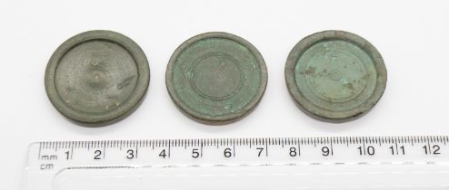 Collection of three 1oz bronze stacking trade weights 2x George and a 1x Post-medieval copper