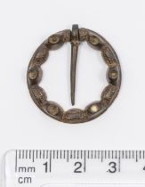 13th/14th Penannual copper alloy brooch. Brooch has 6 possible stone settings situated at equal