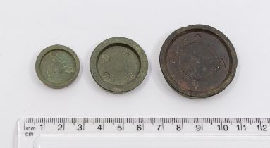 Collection of three bronze stacking trade weights which includes a ½oz William IV (1830-1837).