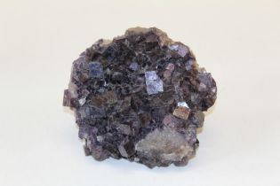 A specimen of purplish blue fluorite crystals in cubic form. Approximate width 21cm, approximate