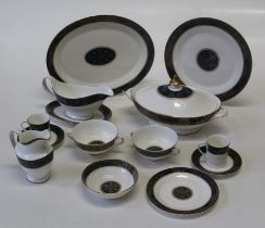 A Royal Doulton Carlyle pattern dinner and tea service. An eight place setting, number 518 First and