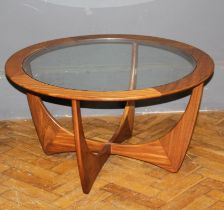 A mid century G Plan Astro coffee table, with teak frame and circular glass inset top, 46 x 84cm