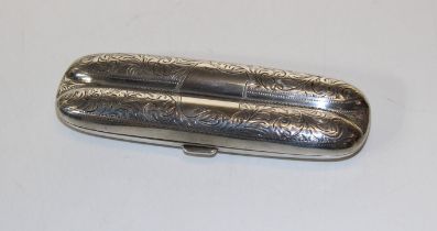 A sterling silver double cigar case with unengraved cartouche, with foliate engraving. Marked for