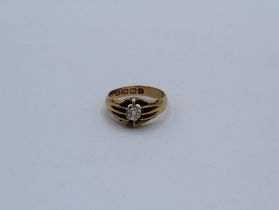 An 18ct yellow gold diamond set ring featuring an old mine cut diamond, approximately 4.1mm x 4.