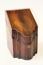 A George III mahogany and strung knife box of serpentine form, the interior fitted as intended, 38cm