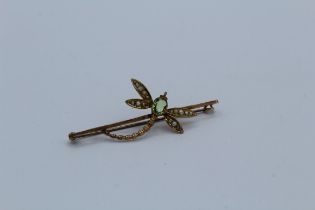 A dragonfly peridot and seed pearl set brooch, marked 9ct, 3.7 grams approximate weight