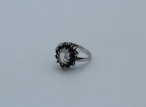 A 9ct white gold sapphire and aquamarine ring, 3gm