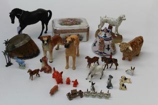 A collection of assorted ceramic figures, to include a Beswick Black Beauty, a Staffordshire