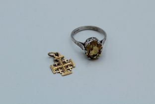 A 14k Jerusalem cross, 0.8gm together with a 9ct white citrine ring, 3.4gm