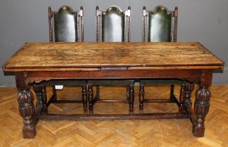 A 17th century and later oak draw leaf refectory table, the plank top with cleated ends over