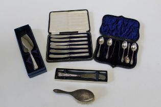 A collection of silver handled items plus a set of five teaspoons (missing one and with replacements
