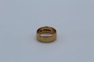 An 18ct yellow gold band ring, approximate weight, 9gm